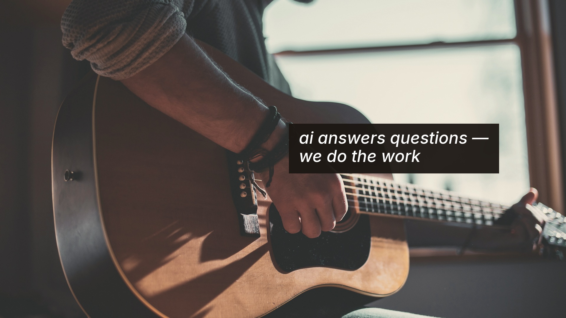 Musician with a guitar — ai answers questions, we do the work (level 1)